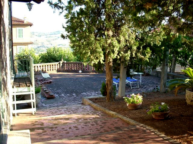Italy Villa back yard view on BitCoin-RealEstate